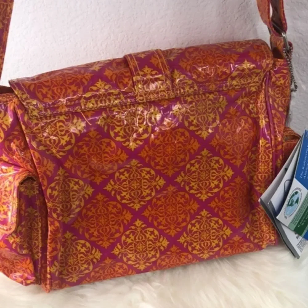 Kelencom Corp. New Orleans diaper orange bag AZO